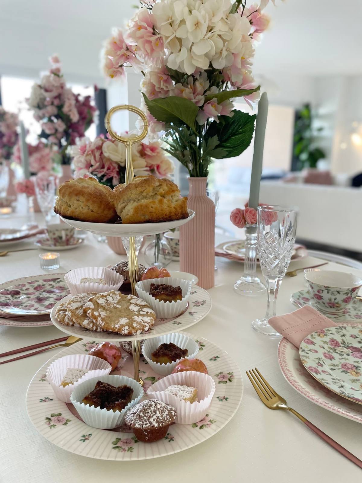Scones and savouries served on a crystal-set tea table